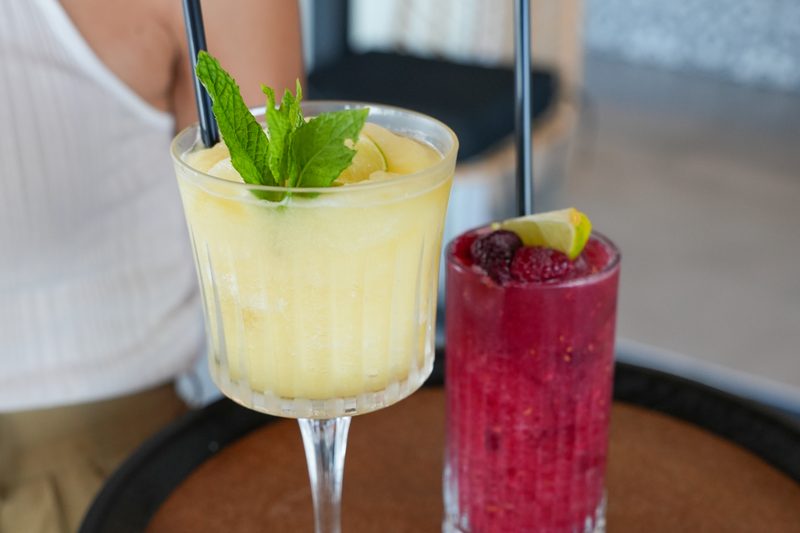 Two cocktails served on a tray at Starlight Beach Bar