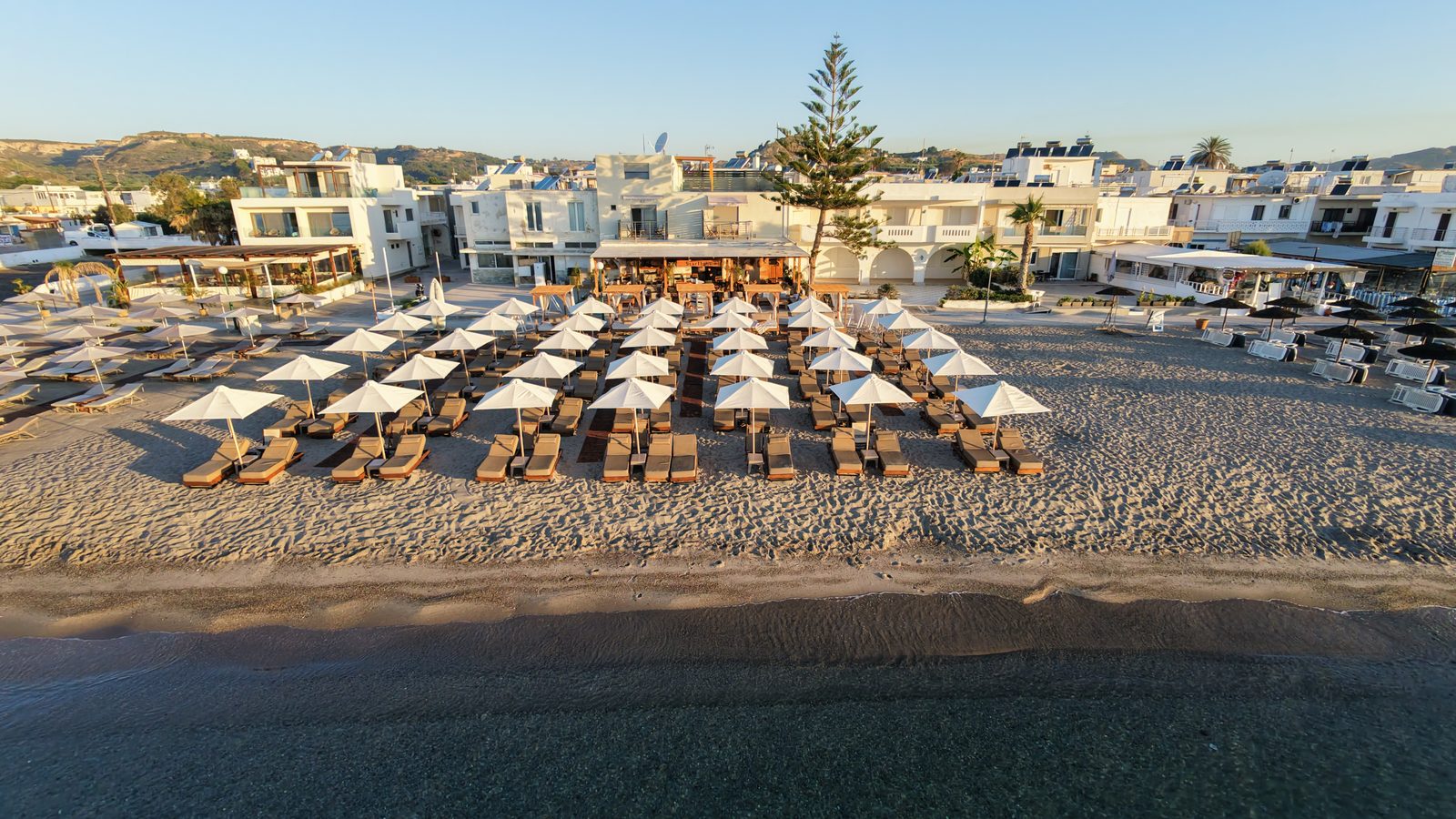 Aerial view of Kardamena beach and the Starlight building from the sea